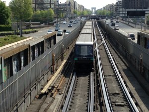 A train on the M1 line (the Arc de Triomphe is in the background, Neuilly in-between)