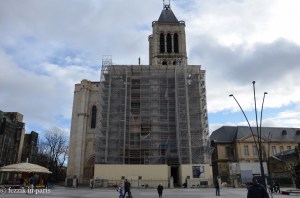The front of the basilica, which is currently undergoing restoration. The city of Saint-Denis is supposedly attempting to secure financing for the reconstruction of the tower that was removed from the left side of the building (the stones are apparently stored on-site somewhere).